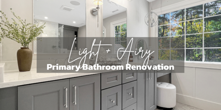 Light and airy primary bathroom renovationwith a double vanity in a blue/gray paint color with white stone countertops, a makeup vanity, and a walk-in shower with three showerhead options.