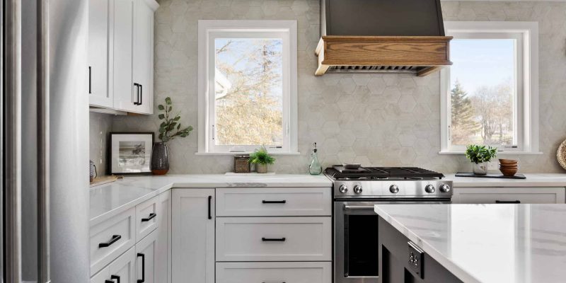 Windows flanking stove