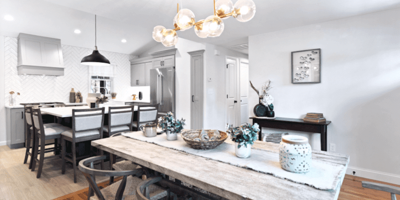 Small kitchen design idea with square island and Crate and Barrel Maddox black bell pendant large