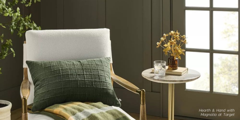 Transition your living space from fall to festive with the Hearth & Hand™ with Magnolia Dark Green Lumbar Pillow—perfect for adding cozy elegance to any room.
