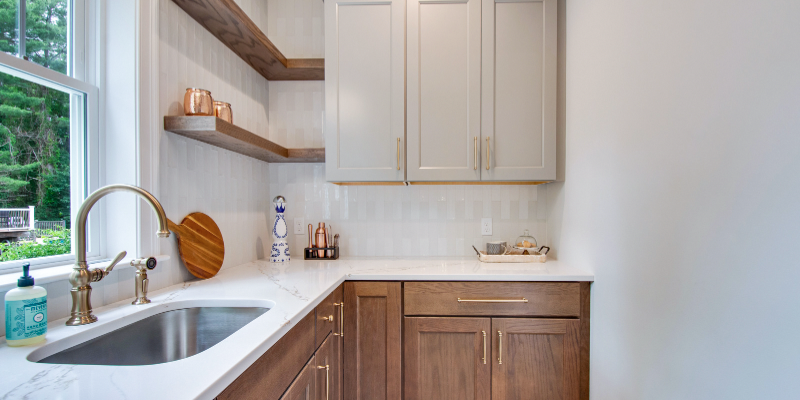 two toned cabinets, taupe and wood cabinets, kohler artifacts faucet, open shelving, pantry ideas