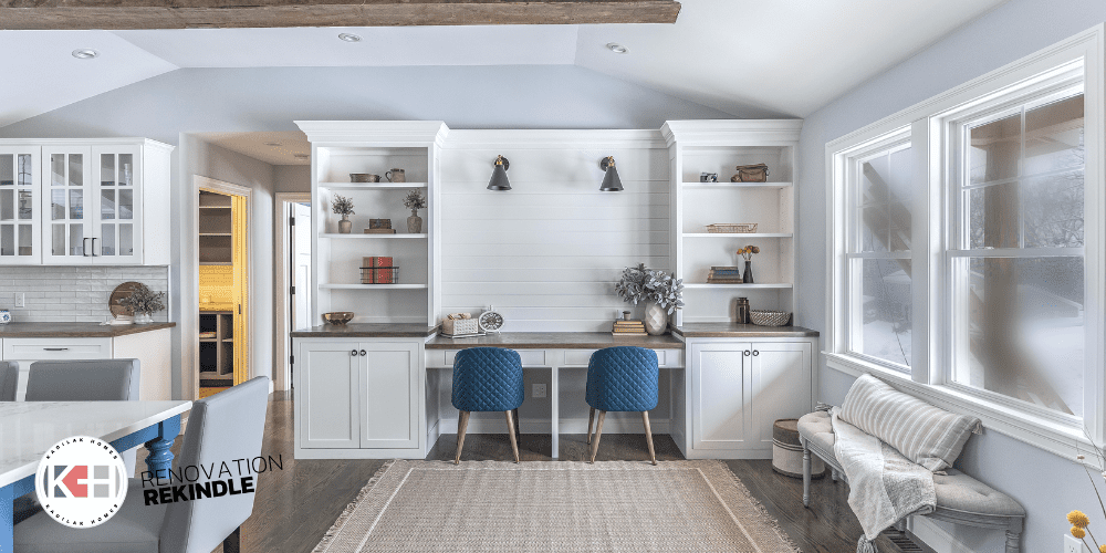 Built in desk with open bookcase with cabinet below. Oak counter top. Blue chairs. Shiplap wall and black sconces. Jute rug. Wood beams. Home office ideas, built in desk ideas, office storage ideas, Sherwin williams reflection