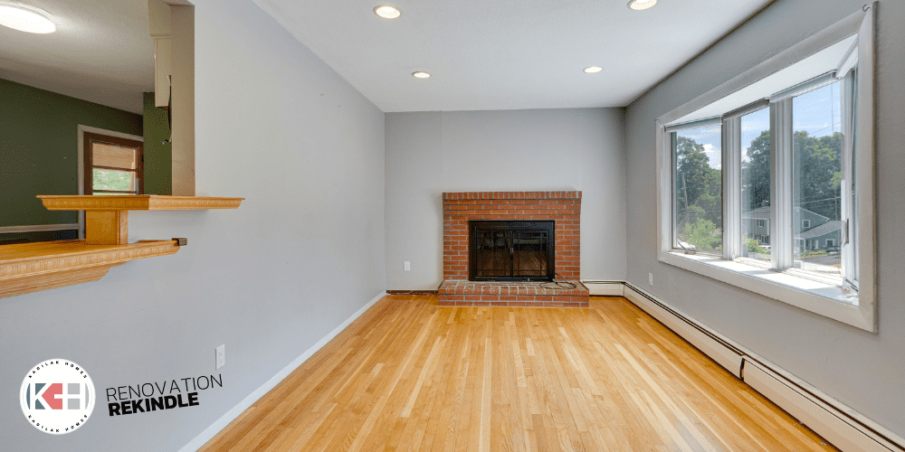 narrow living room with fireplace