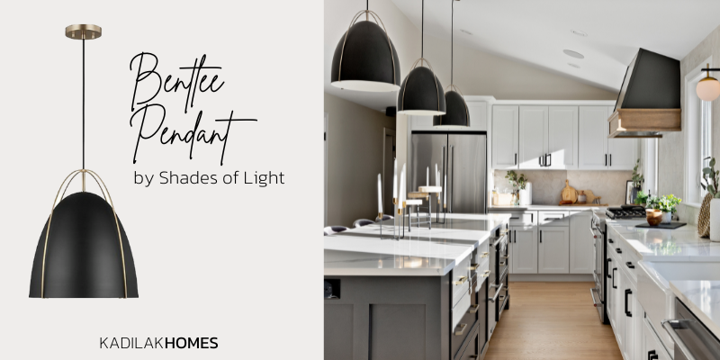 bentlee kitchen pendant, large black pendant lighting, black and brass pendant lighting, kitchen lighting ideas, white kitchen with charcoal island, range hood with wood trim, angle range hood, wall sconces in kitchen, semi professional kitchen faucet, kohler whitehaven sink, kitchen ideas for single level home, kitchen with vaulted ceiling