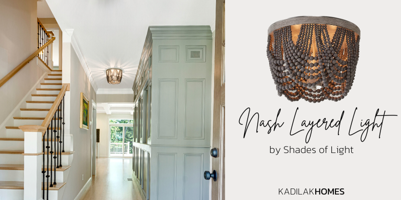 Nash layered ceiling light, foyer lighting ideas, stained wood front door, entryway millwork ideas, black metal balusters on stairway, entry ideas, sherwin williams ellie gray