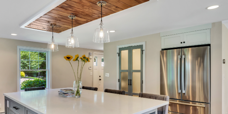 Natural wood coffered ceiling idea, kitchen island with bookcase