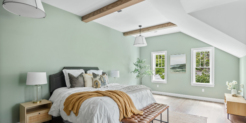 primary suite, bedroom paint color ideas, bedroom with ceiling beams, benjamin moore misted green, stained hardwood floors