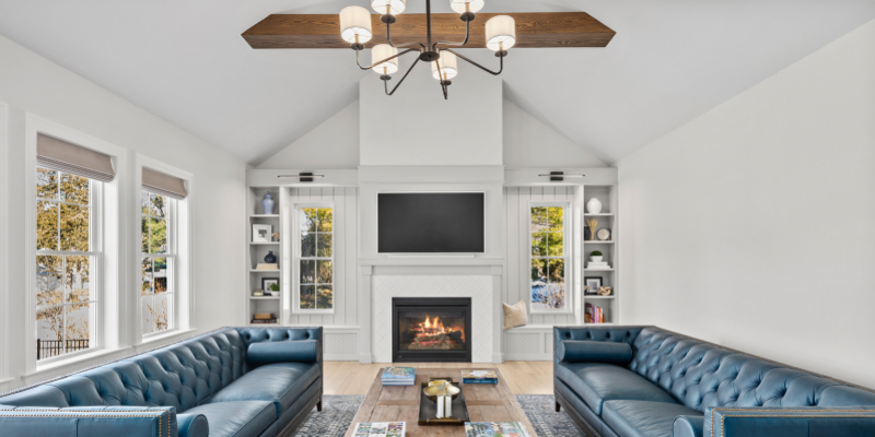 fireplace surround with window seat, book cases, benjamin moore Smoke Embers AC-28, flip top seats, fireplace with window on either side, vaulted ceiling with stained beams