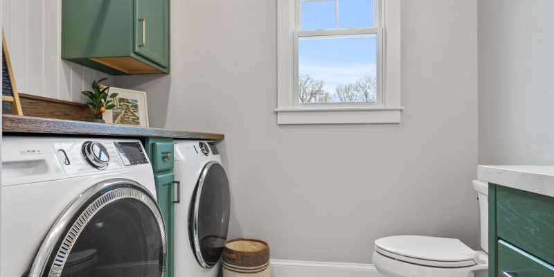 1990's maple bathroom cabinet and laundry room makeover, green bathroom cabinets, gray checkered tile floors, purist kohler faucet, laundry room with storage and hanging, laundry ideas, wood counter in laundry room, benjamin moore gothic Green, benjamin moore balboa mist